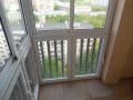 Панорамное остекление балкона и отделка пола плиткой в Котельниках