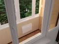 Теплое остекление лоджии пластиковыми окнами и отопительным конвектором в Котельниках