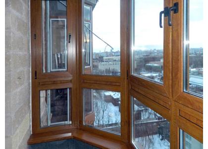 Французское остекление балкона профилем Veka с ламинированием под дерево в Котельниках