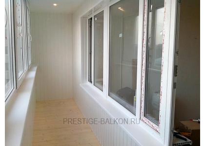 Теплое остекление балкона профилем rehau с утеплением и деревянной отделкой в Котельниках