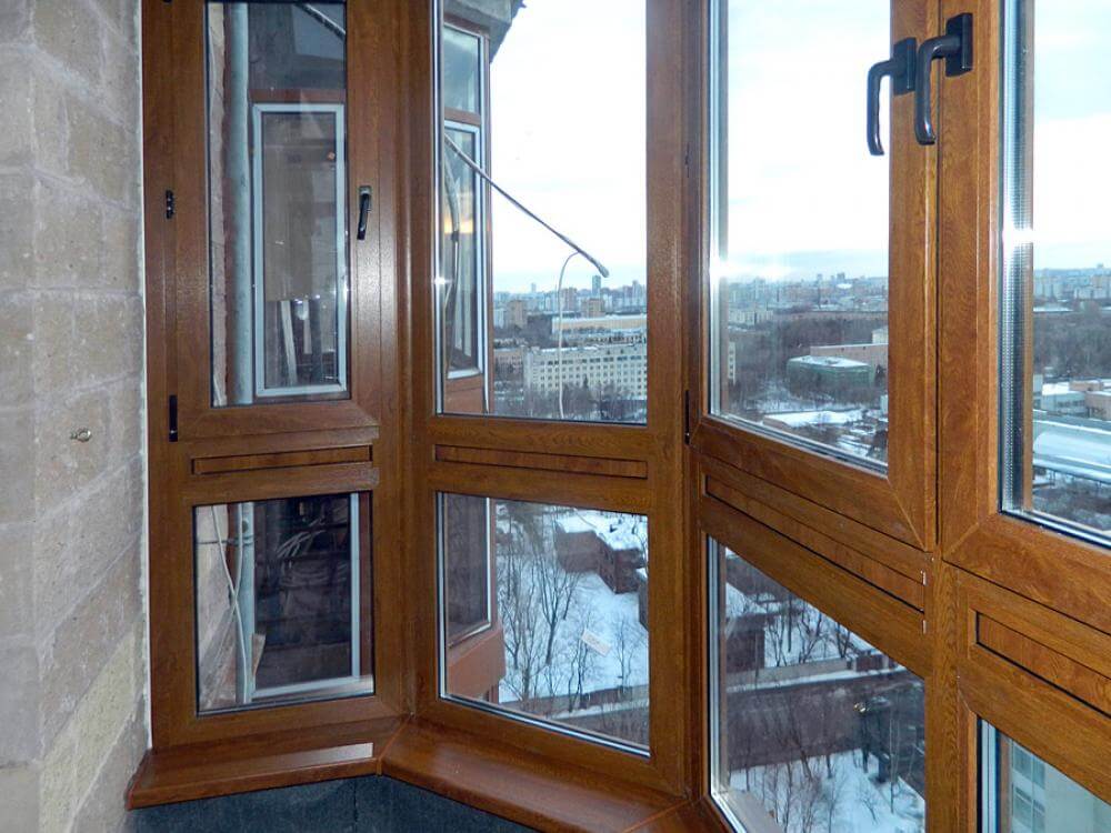 Французское остекление балкона профилем Veka с ламинированием под дерево в Котельниках